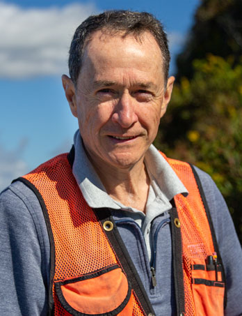 An image of Scott Rabideau owner of NRS Wetlands in the field